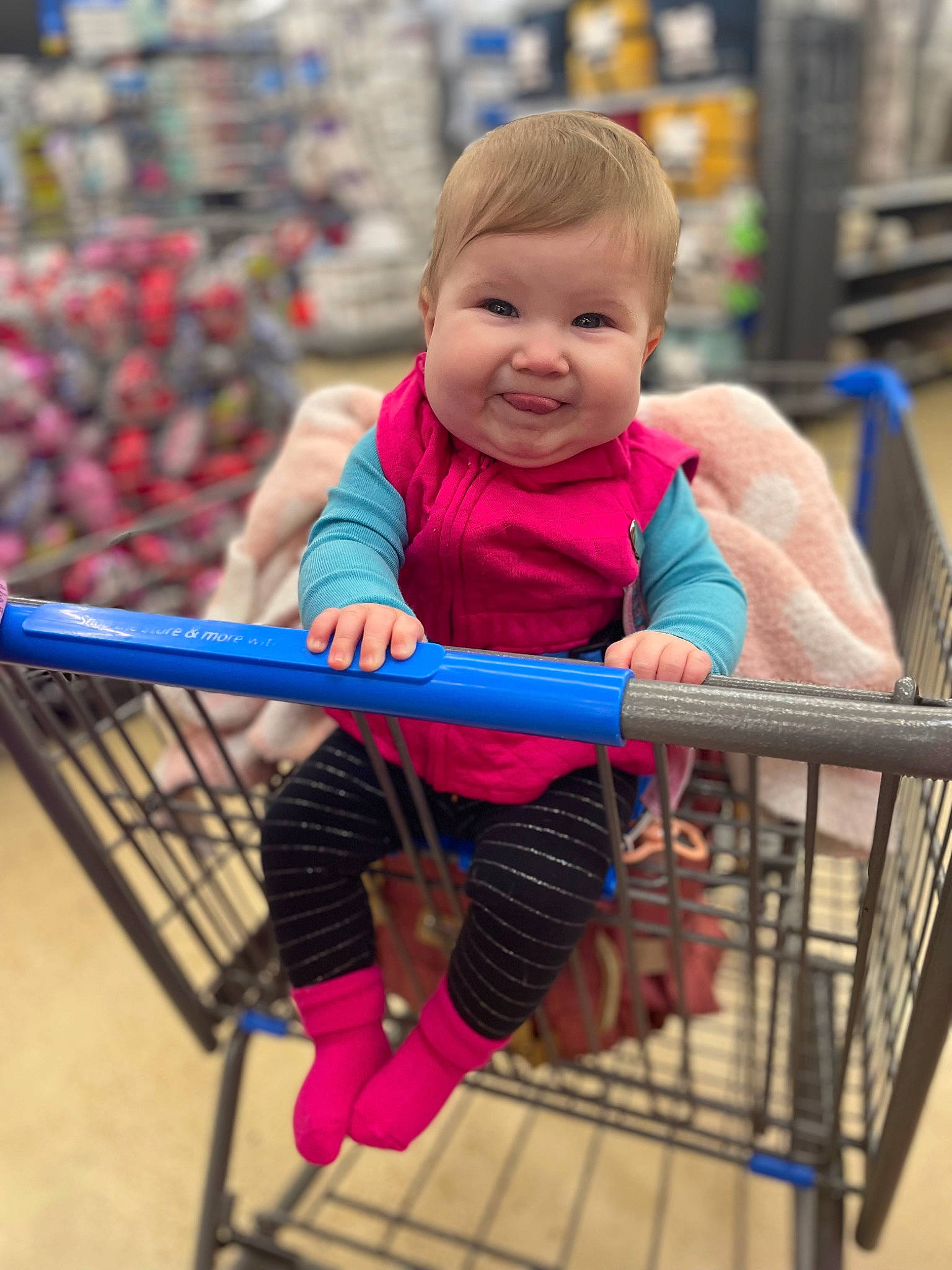 Justine joined the competition — help win amazing prizes! baby, baby_products, baby_safety, baby_toddler_clothing, child, city, clothing, electric_blue, fun, happy, joy, leisure, person, play, recreation, sitting, smile, tire, toddler, vacation