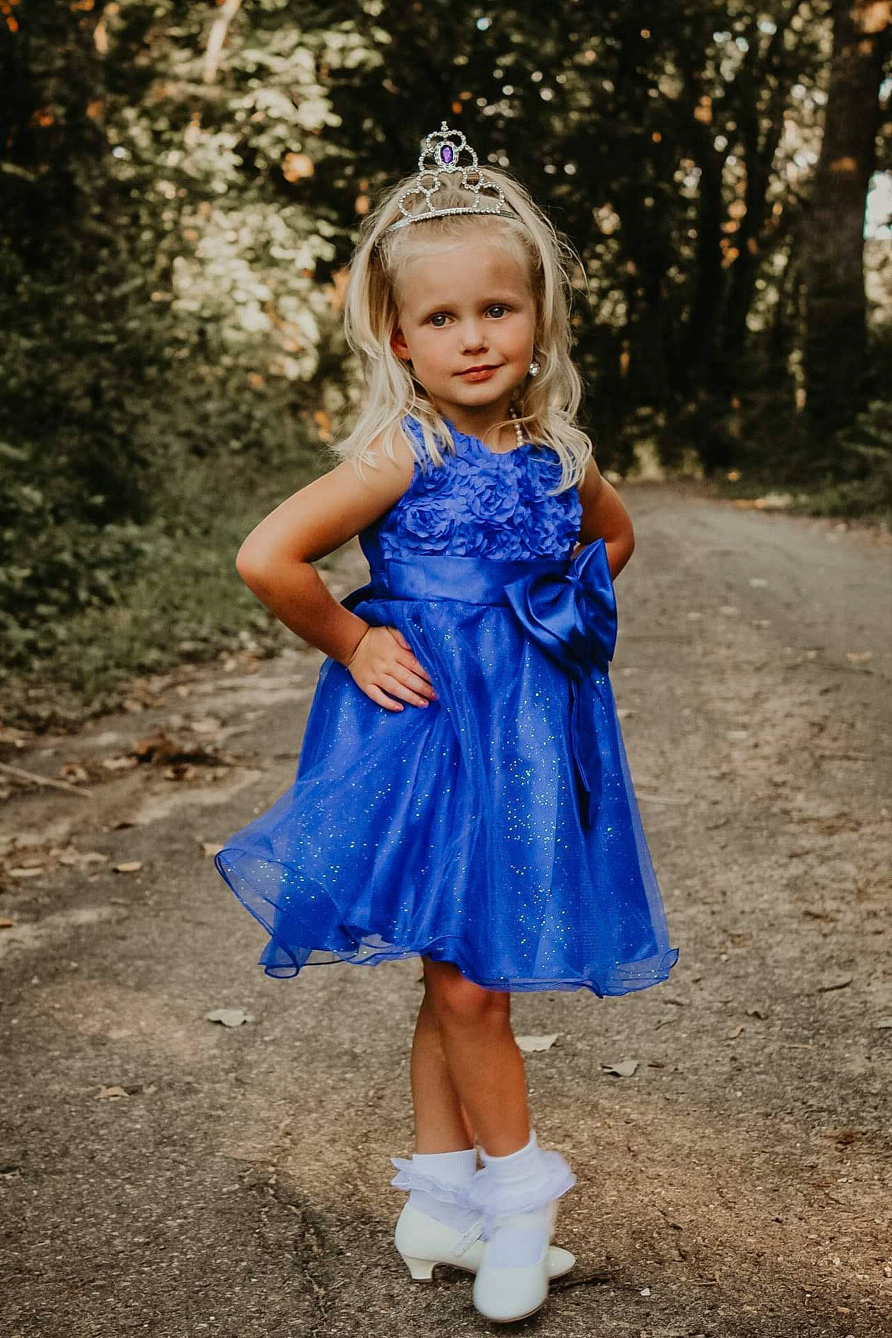 Juliette joined the competition — help win amazing prizes! blue, bridal_party_dress, child, child_model, clothing, cobalt_blue, costume, dress, electric_blue, fashion_accessory, footwear, hair_accessory, headpiece, joy, pattern, person, shoe, smile, textile, toddler