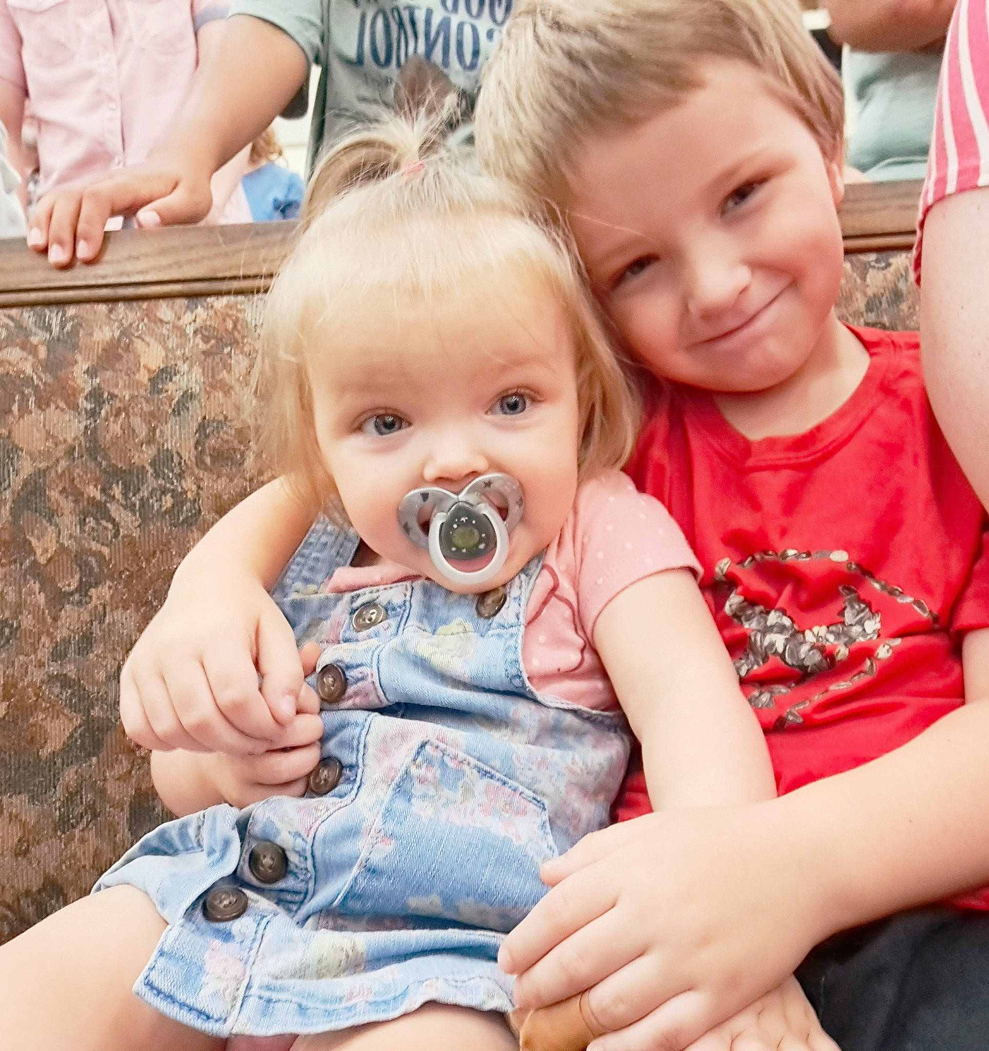 Brenner joined the competition — help win amazing prizes! baby, baby_toddler_clothing, chair, cheek, child, event, fun, grass, happy, head, interaction, iris, joy, person, product, sharing, sitting, skin, smile, t_shirt