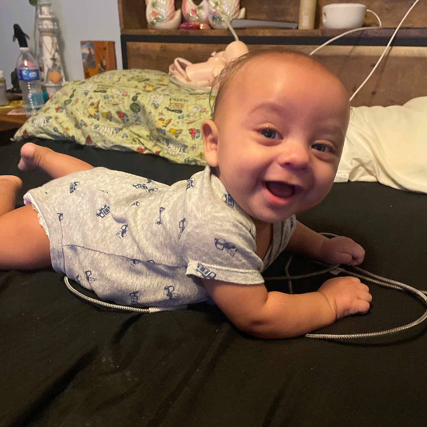 Tiberias joined the competition — help win amazing prizes! baby, bed, clothing, cute, decor, face, foot, furniture, hand, happy, head, indoors, infant, lying_down, person, pillow, room, skin, smiling, toy