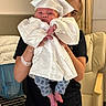 Anthony joined the competition — help win amazing prizes! adult, baby, casual, celebration, chair, clothing, cute, fabric, feet, graduation_cap, graduation_gown, hands, headwear, holding, indoor, infant, newborn, person, portrait, small