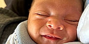 Jayden a rejoint le concours — aidez-le/la à gagner de superbes lots ! baby, newborn, smile, sleeping, face, closeup, infant, soft, fabric, comfort, cute, peaceful, skin, clothing, portrait, tiny, human, head, resting, warm