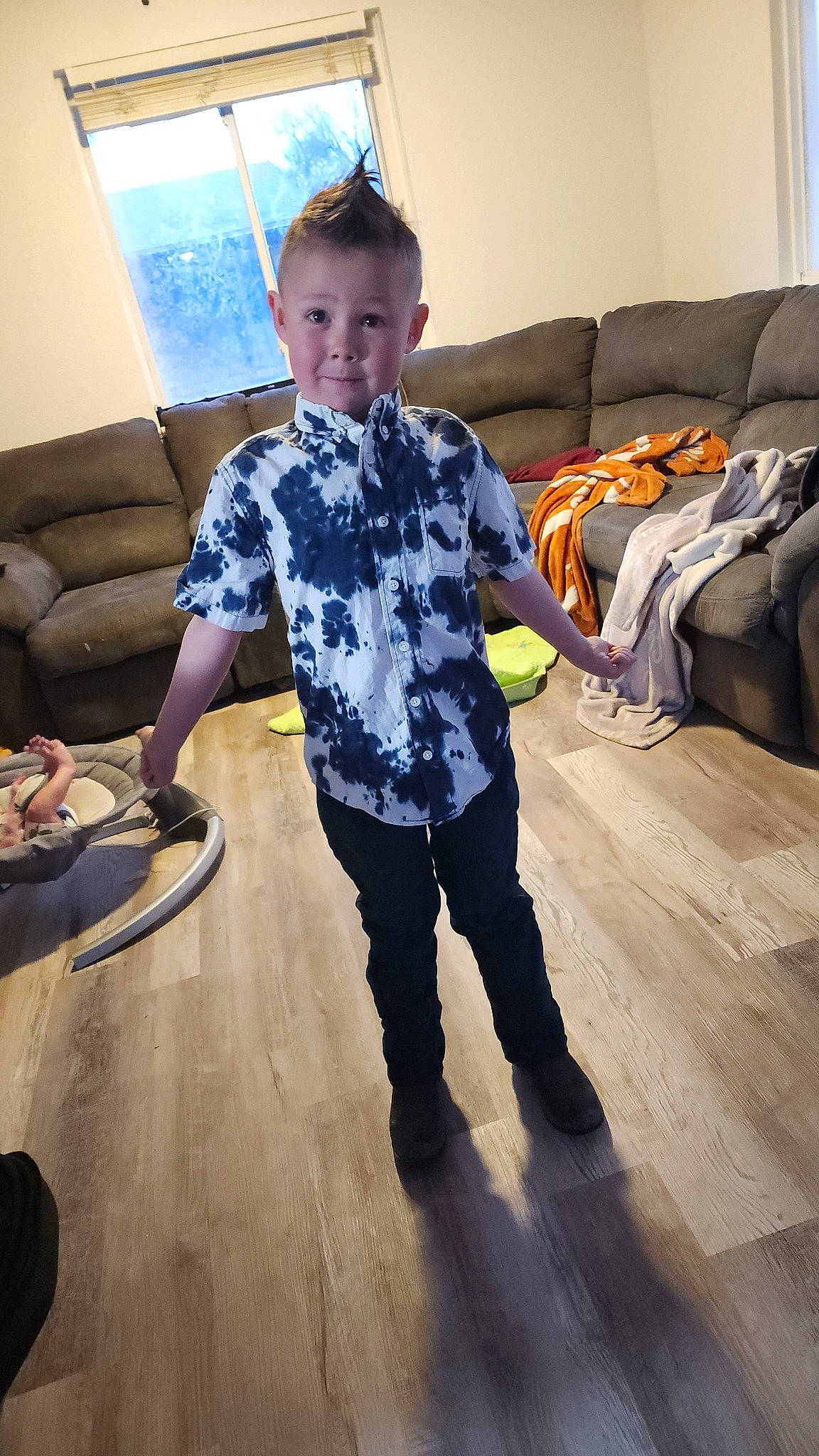 Grant joined the competition — help win amazing prizes! child, comfort, couch, floor, flooring, fun, furniture, happy, hardwood, living_room, pattern, person, picture_frame, sitting, sleeve, smile, table, toddler, waist, wood