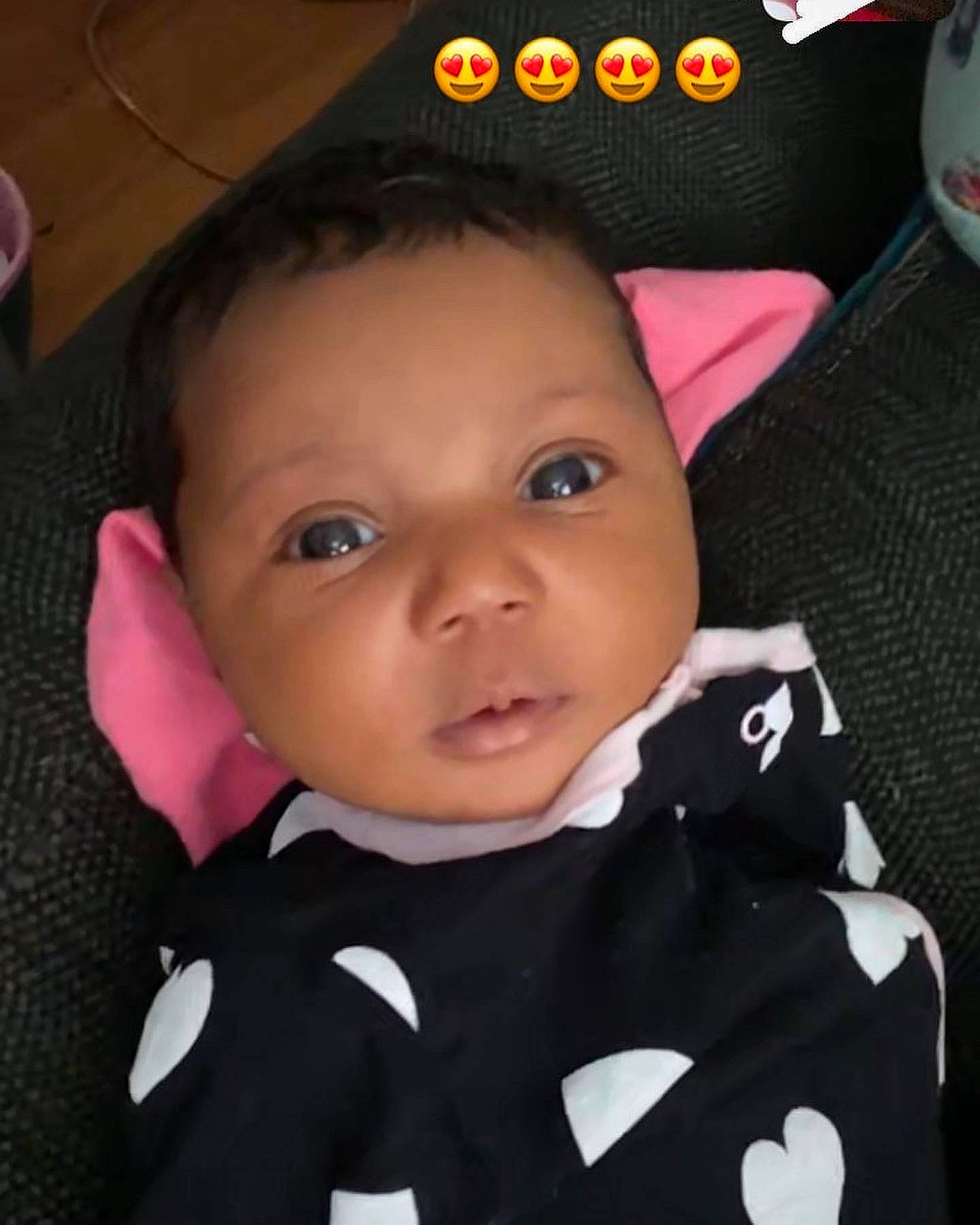 Journee is registered to the contest to win money with this photo: baby, baby_toddler_clothing, black, carmine, cheek, child, collar, eyebrow, eyelash, fashion_accessory, formal_wear, happy, iris, lip, nose, outerwear, person, pink, skin, sleeve