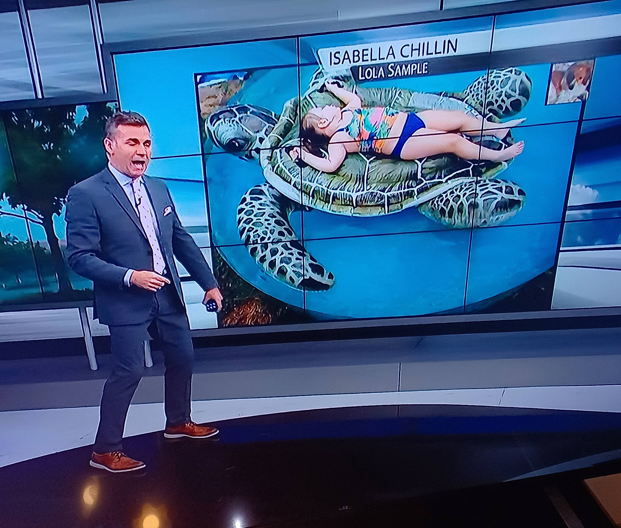 Isabella is registered to the contest to win money with this photo: advertising, art, automotive_design, automotive_exterior, blazer, display_device, electric_blue, event, formal_wear, gadget, graphics, led_backlit_lcd_display, luxury_vehicle, machine, motor_vehicle, news, person, recreation, suit, tie