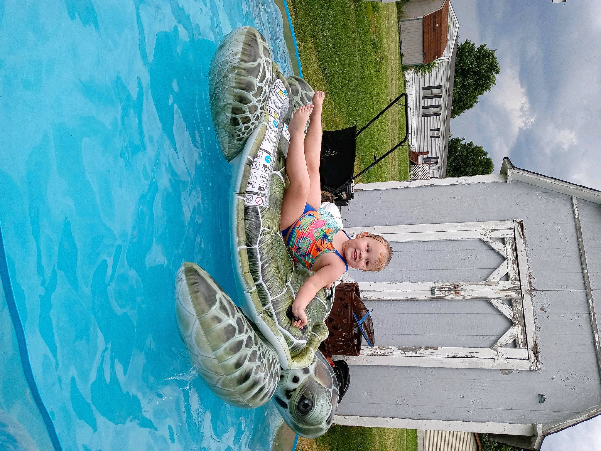 Isabella joined the competition — help win amazing prizes! boats_and_boating_equipment_and_supplies, child, cloud, fun, grass, green, happy, joy, leisure, person, recreation, shorts, toddler, travel, tree, vacation, water, wing