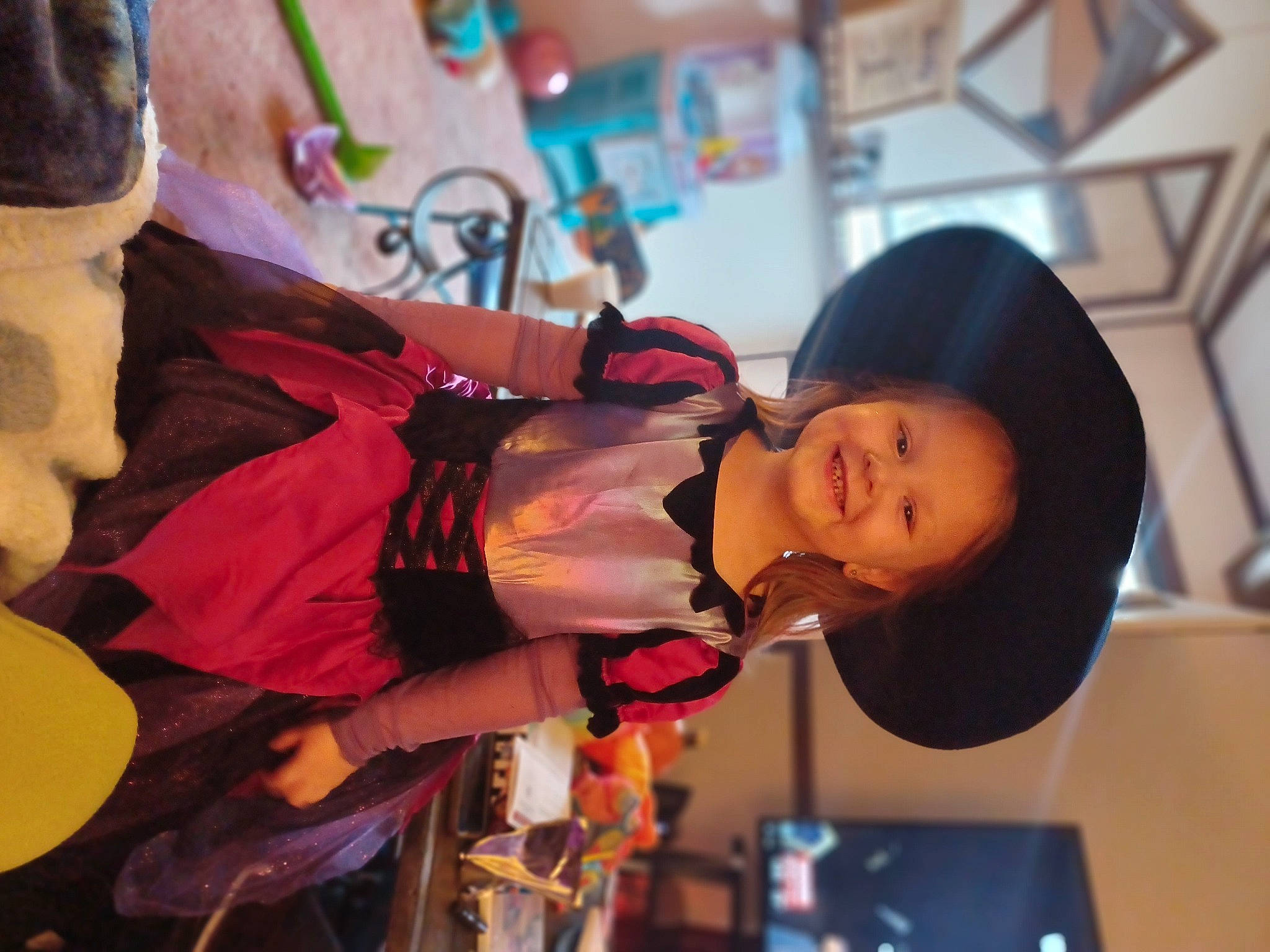 Isabella is registered to the contest to win money with this photo: animation, black_hair, child, costume, entertainment, event, fashion_design, fun, happy, jewellery, joy, leisure, magenta, performance, person, purple, recreation, room, tradition