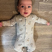 Atlas joined the competition — help win amazing prizes! baby, infant, wooden_floor, onesie, bear_pattern, sleepwear, arms_outstretched, cute, child, portrait, indoors, flooring, person, young_child, smiling, head, face, eyes, expression, cozy