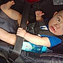 Tyrin joined the competition — help win amazing prizes! baby, car_seat, safety_belt, bottle, child, infant, blue_shirt, hand, foot, face, skin, seat, straps, plastic_bottle, stars, red_marks, young_child, closeup, indoors, person