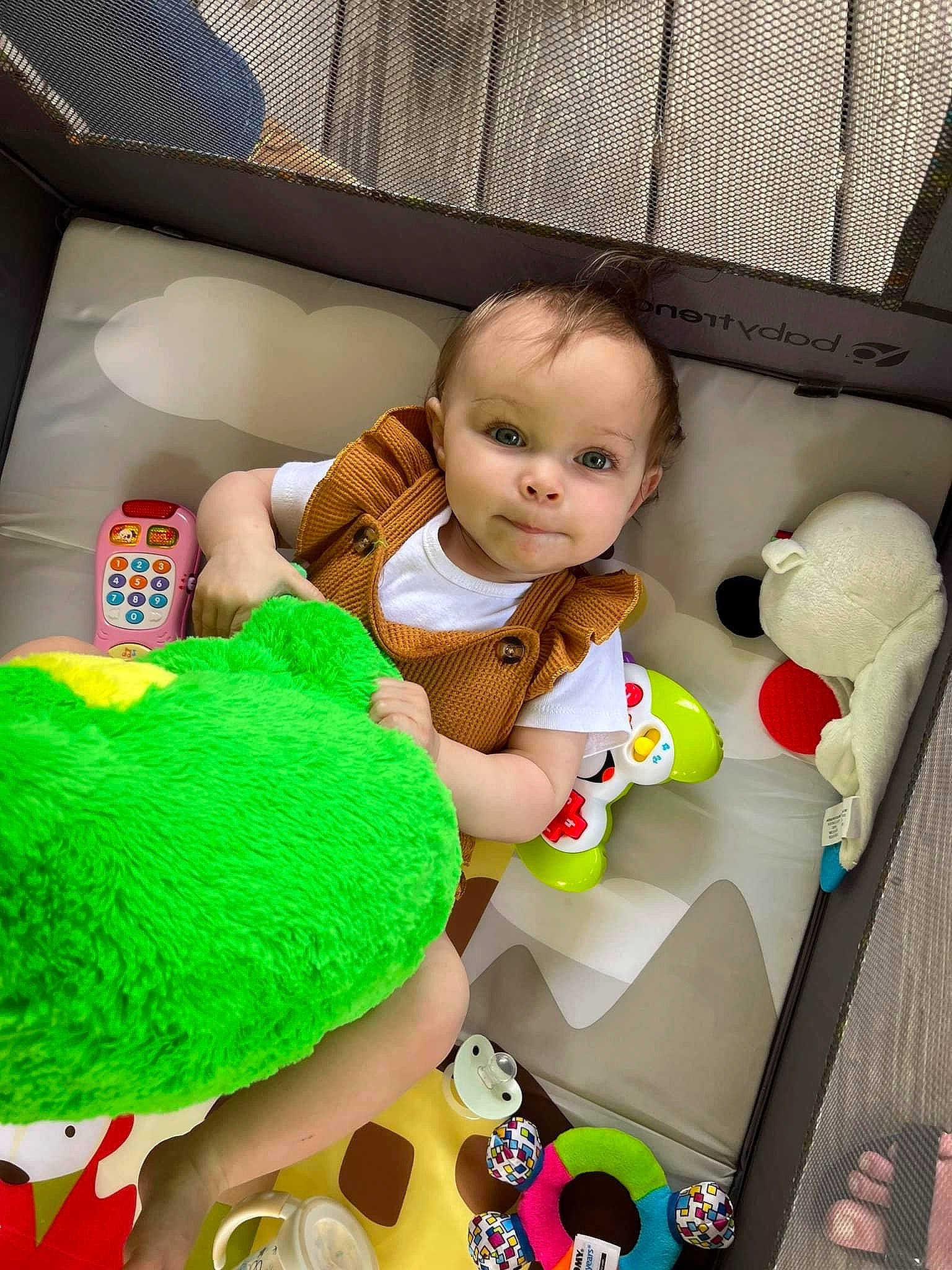 Renesmee is registered to the contest to win money with this photo: baby, baby_products, baby_toddler_clothing, baby_toys, child, comfort, couch, fun, grass, linens, mammal, person, plush, product, room, sitting, sock, stuffed_toy, textile, toddler