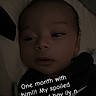 Rj is registered to the contest to win money with this photo: baby, infant, face, lying_down, pacifier, clothing, dark, portrait, child, newborn, expression, closeup, indoors, person, cute, sleepy, young, human, text_overlay, love