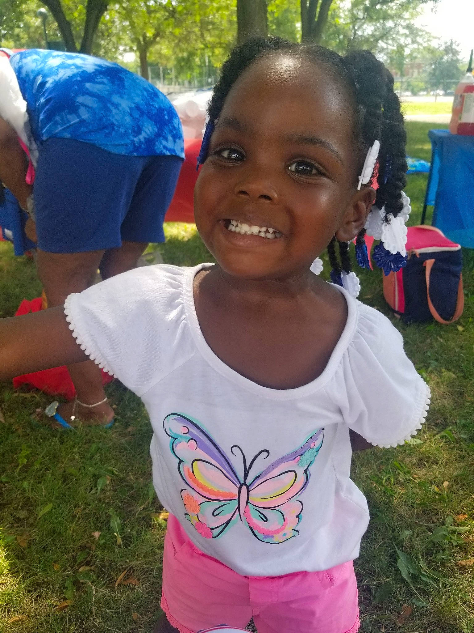 Harmonee is registered to the contest to win money with this photo: adaptation, child, community, face, joy, person, smile, style, summer, t_shirt