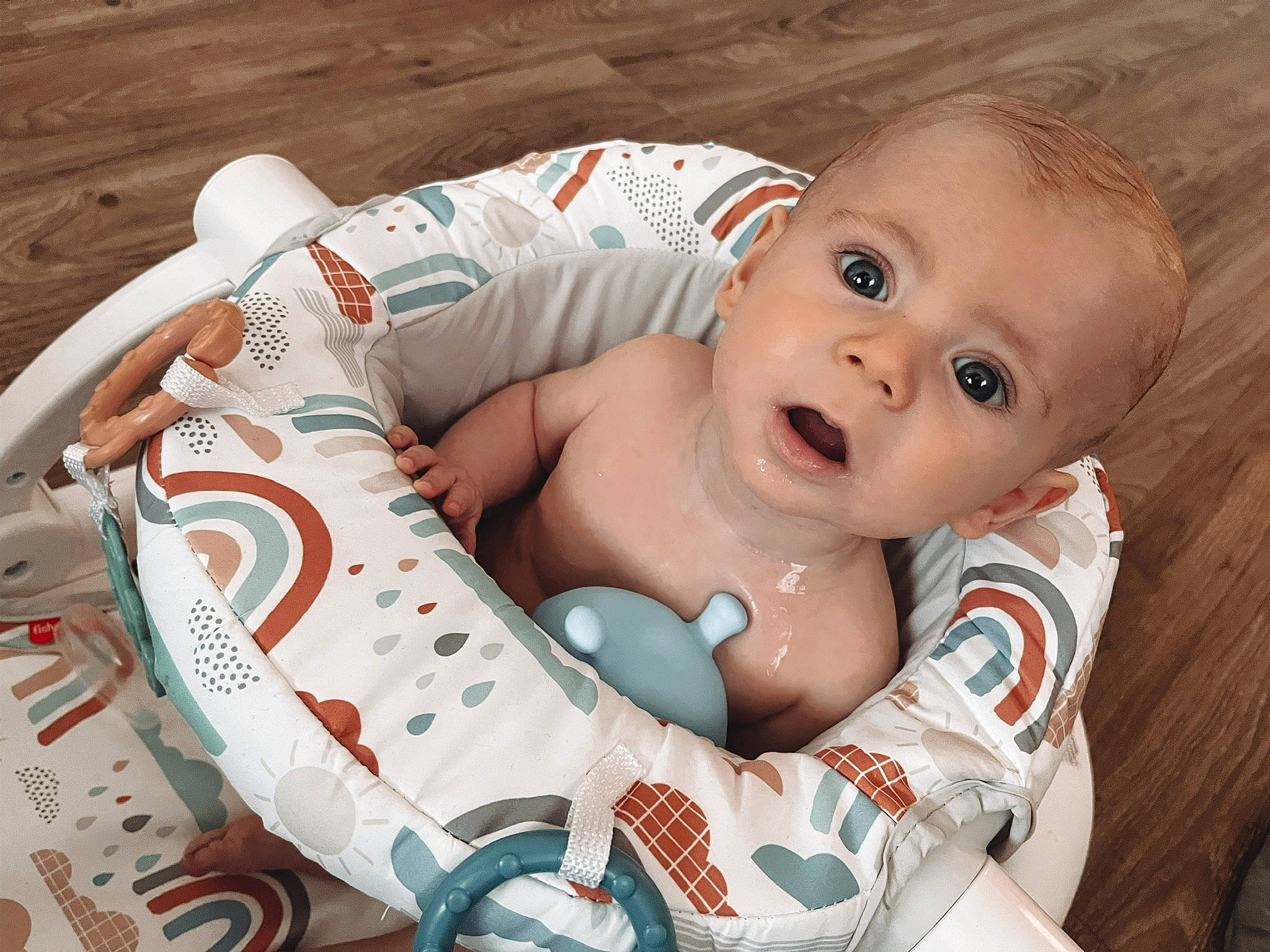 Draven is registered to the contest to win money with this photo: abdomen, arm, baby, baby_products, baby_sleeping, baby_toddler_clothing, cheek, child, comfort, flash_photography, happy, iris, linens, pattern, person, sitting, skin, surprise, toddler, toy