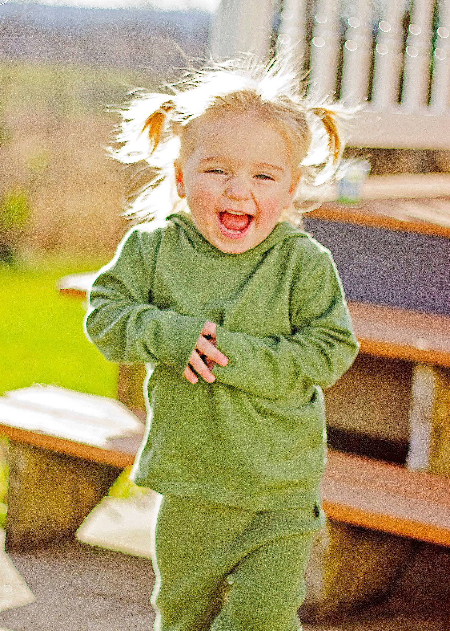 Caicalia is registered to the contest to win money with this photo: baby, baby_toddler_clothing, cheek, child, eye, face, fun, grass, happy, head, human_body, leisure, people_in_nature, person, product, skin, sleeve, smile, standing, toddler