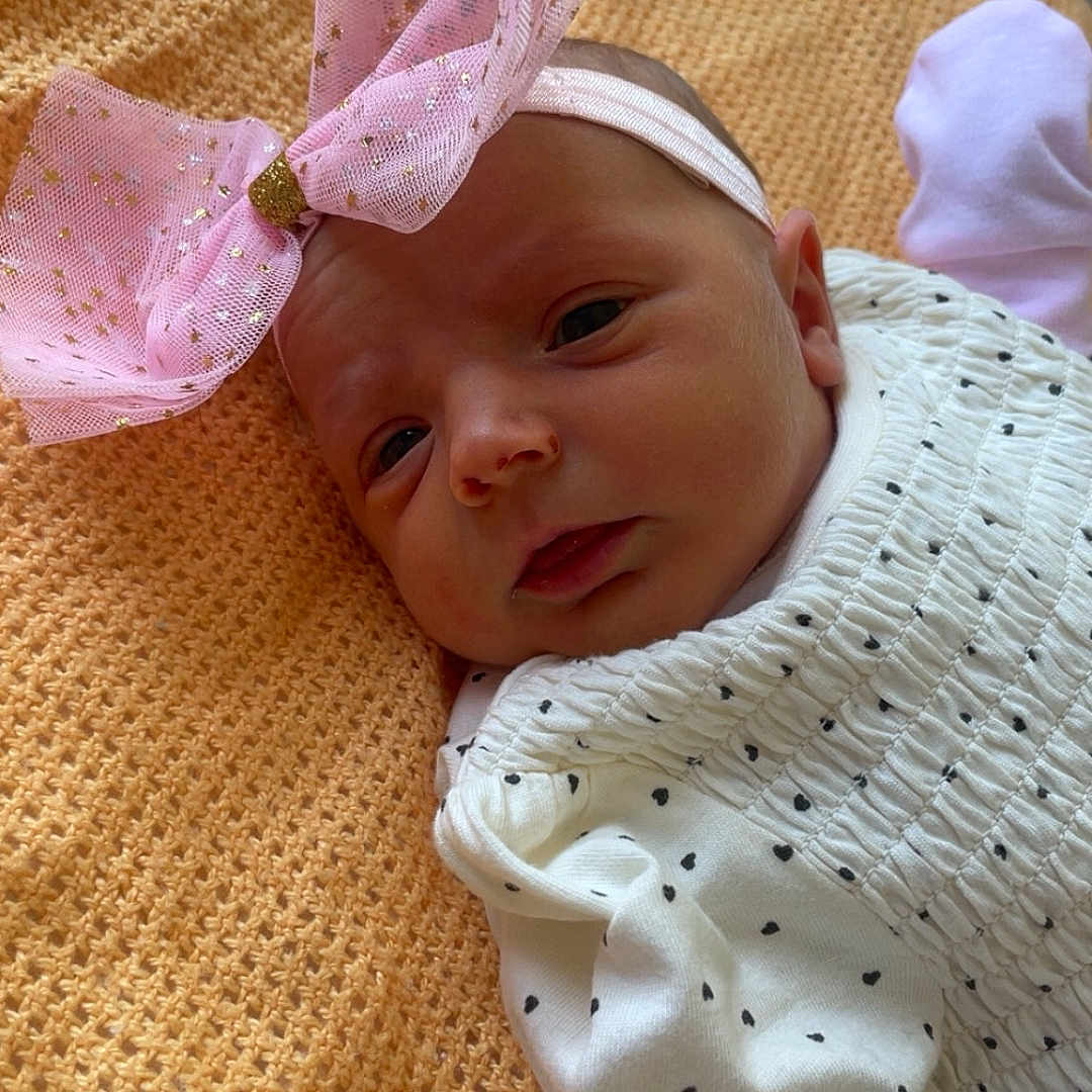 Harlow-Jade joined the competition — help win amazing prizes! baby, bed, bedroom, blanket, bonnet, clothing, cushion, face, furniture, hat, head, homedecor, indoors, newborn, person, photography, portrait, quilt, room, sleeping