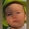 toddler, child, face, hat, green_hat, bucket_hat, white_shirt, outdoor, nature, sunlight, portrait, serious_expression, young_child, blue_eyes, closeup, headwear, summer, daylight, baby, person