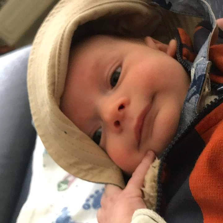 Remington is registered to the contest to win money with this photo: baby, baby_products, cheek, child, comfort, eye, eyebrow, eyelash, happy, hat, iris, lip, mouth, nose, person, skin, smile, sun_hat, toddler, tree