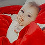 baby, child, blanket, red_blanket, hand, face, eyes, infant, cute, cozy, indoor, person, sitting, soft_texture, warm, clothing, cute_expression, portrait, young_child, comfort