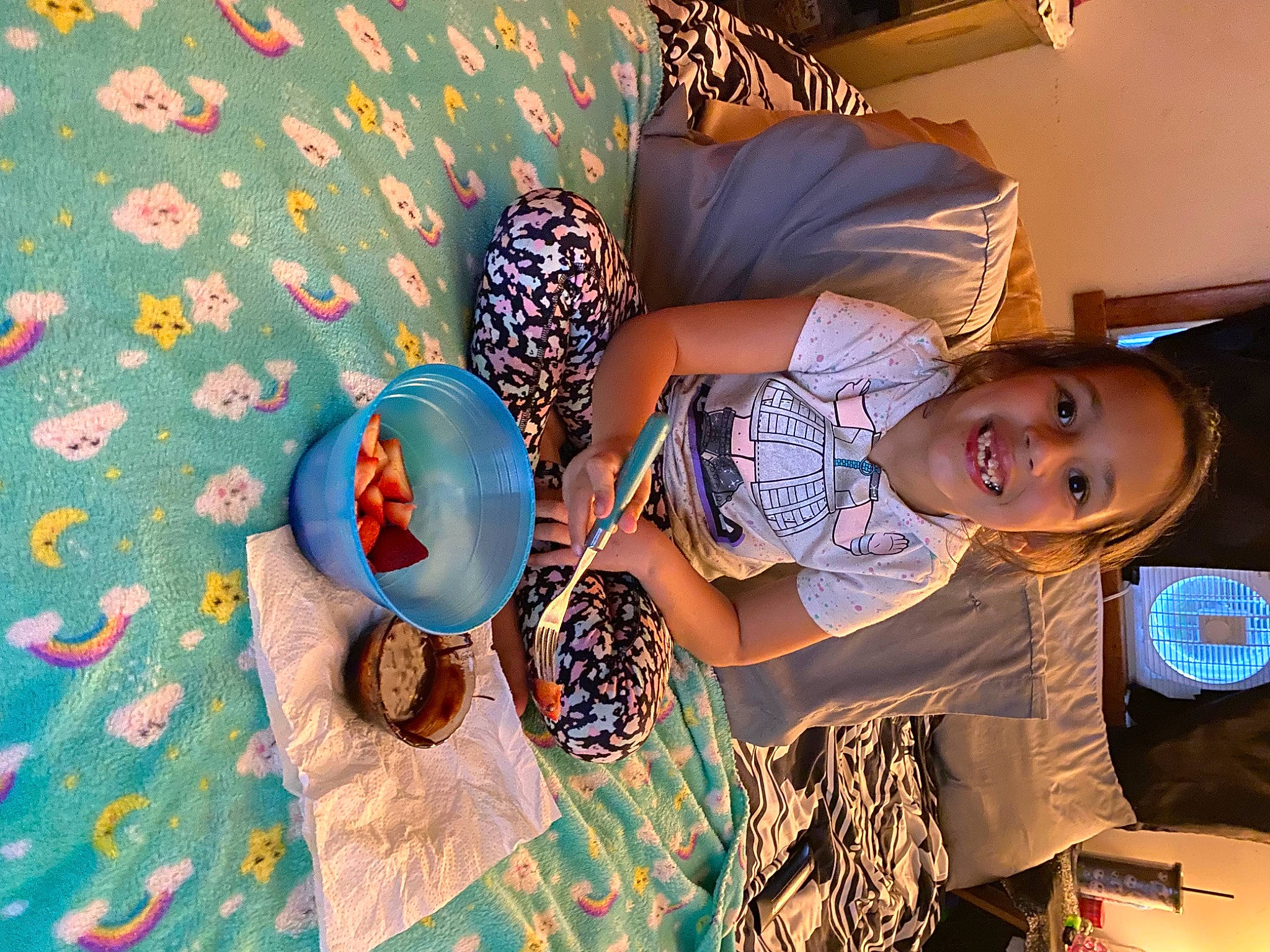 Destinee is registered to the contest to win money with this photo: child, event, fun, happy, hat, joy, leisure, linens, party, pattern, person, play, room, sitting, smile, t_shirt, textile, toddler, tree, vacation