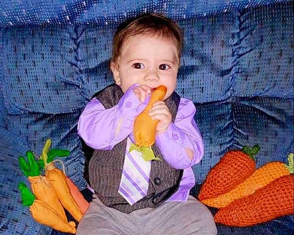 Ashton joined the competition — help win amazing prizes! baby, baby_products, baby_toddler_clothing, cheek, child, comfort, eye, face, finger, head, mouth, nose, orange, person, purple, sitting, skin, stuffed_toy, textile, toddler