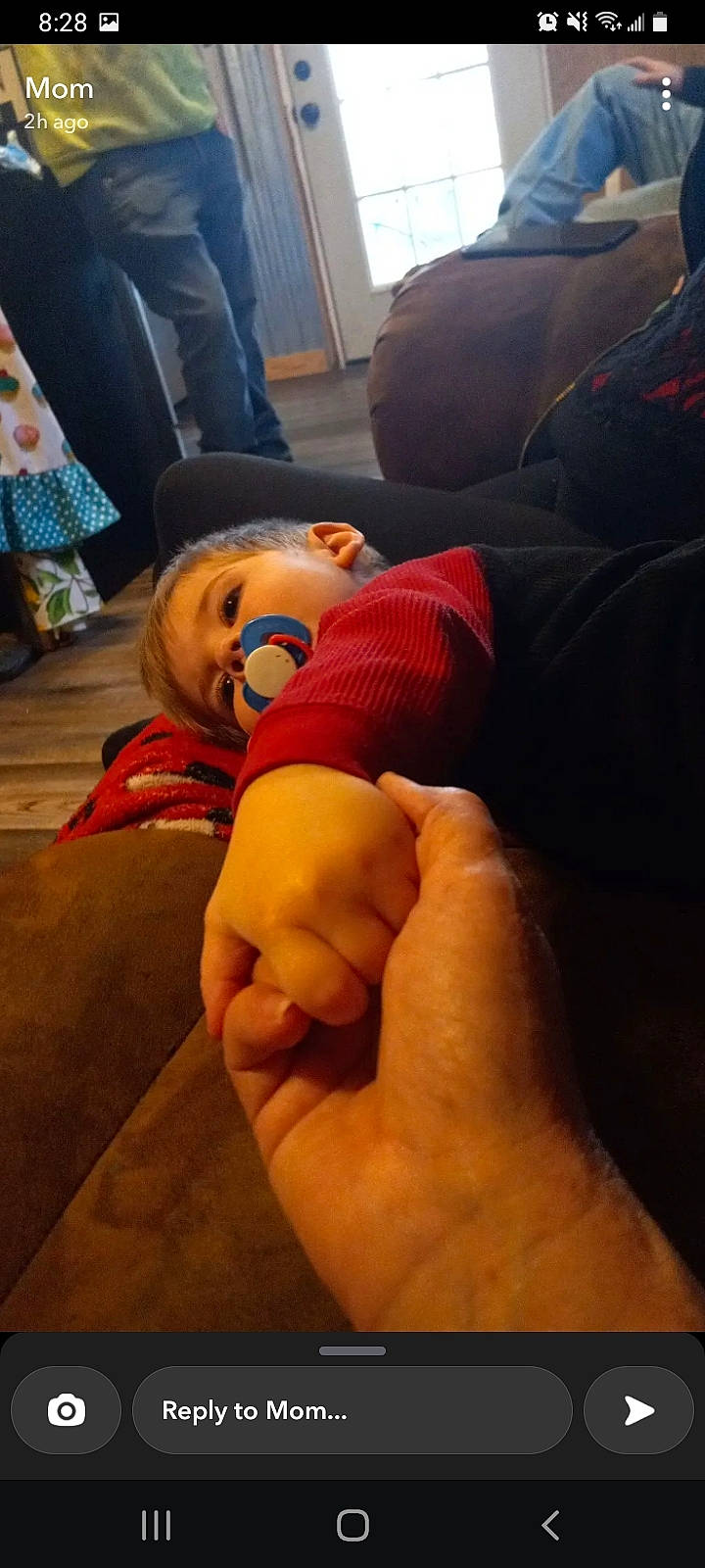 Ashton is registered to the contest to win money with this photo: comfort, elbow, eyewear, finger, flooring, gesture, glasses, goggles, hat, human_leg, joint, knee, lap, nail, person, sunglasses, thigh, thumb, trunk, wood