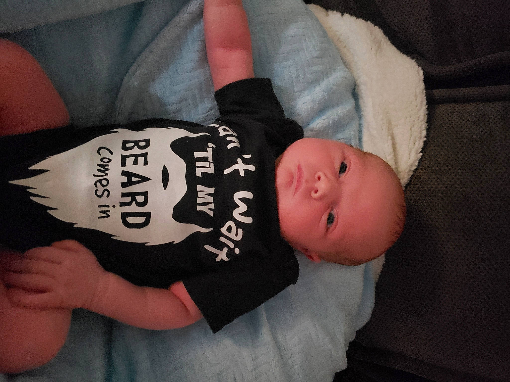 Deacon is registered to the contest to win money with this photo: baby, baby_toddler_clothing, comfort, elbow, finger, font, gesture, hand, head, human_body, human_leg, knee, nail, person, product, sitting, sleeve, thigh, thumb, toddler