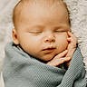 baby, sleeping, blanket, blue, infant, face, hand, soft, cozy, portrait, peaceful, newborn, wrapped, texture, cute, young, child, resting, closeup, serene