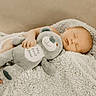 Julian is registered to the contest to win money with this photo: baby, sleeping, plush_toy, teddy_bear, blanket, cozy, infant, child, soft_texture, cute, peaceful, resting, cuddle, nursery, comfort, fuzzy, adorable, small_hand, foot, relaxation