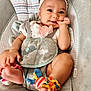 Zya is registered to the contest to win money with this photo: baby, infant, smiling, headband, flower, baby_seat, elephant_patch, colorful, ankle_rattles, hand, feet, clothing, cute, playful, indoors, person, child, portrait, happy, seat