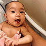 Zya joined the competition — help win amazing prizes! baby, child, bath, bathtub, water, smile, happy, arm, skin, infant, cute, playful, splash, person, face, hand, foot, closeup, indoors, parent
