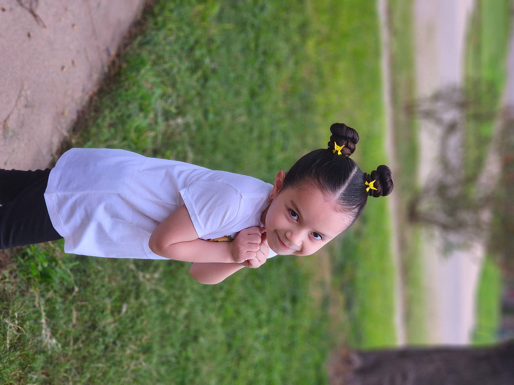 Ariah is registered to the contest to win money with this photo: child, dress, eyewear, flash_photography, fun, glasses, grass, happy, joy, leisure, people_in_nature, person, plant, plant_stem, recreation, smile, sunglasses, toddler, tree, wood