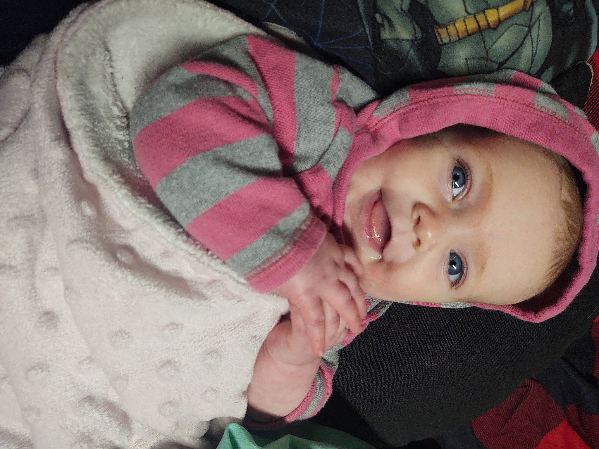 Delaney is registered to the contest to win money with this photo: baby, baby_toddler_clothing, cheek, child, comfort, eye, eyebrow, happy, hat, iris, lip, magenta, nose, person, pink, purple, skin, sleeve, smile, toddler