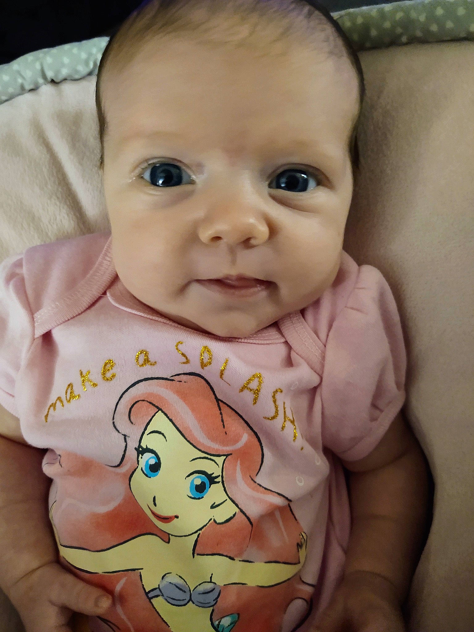 Delaney is registered to the contest to win money with this photo: baby, baby_toddler_clothing, cheek, child, chin, collar, eye, eyebrow, eyelash, happy, head, iris, lip, mouth, neck, nose, person, skin, sleeve, stomach