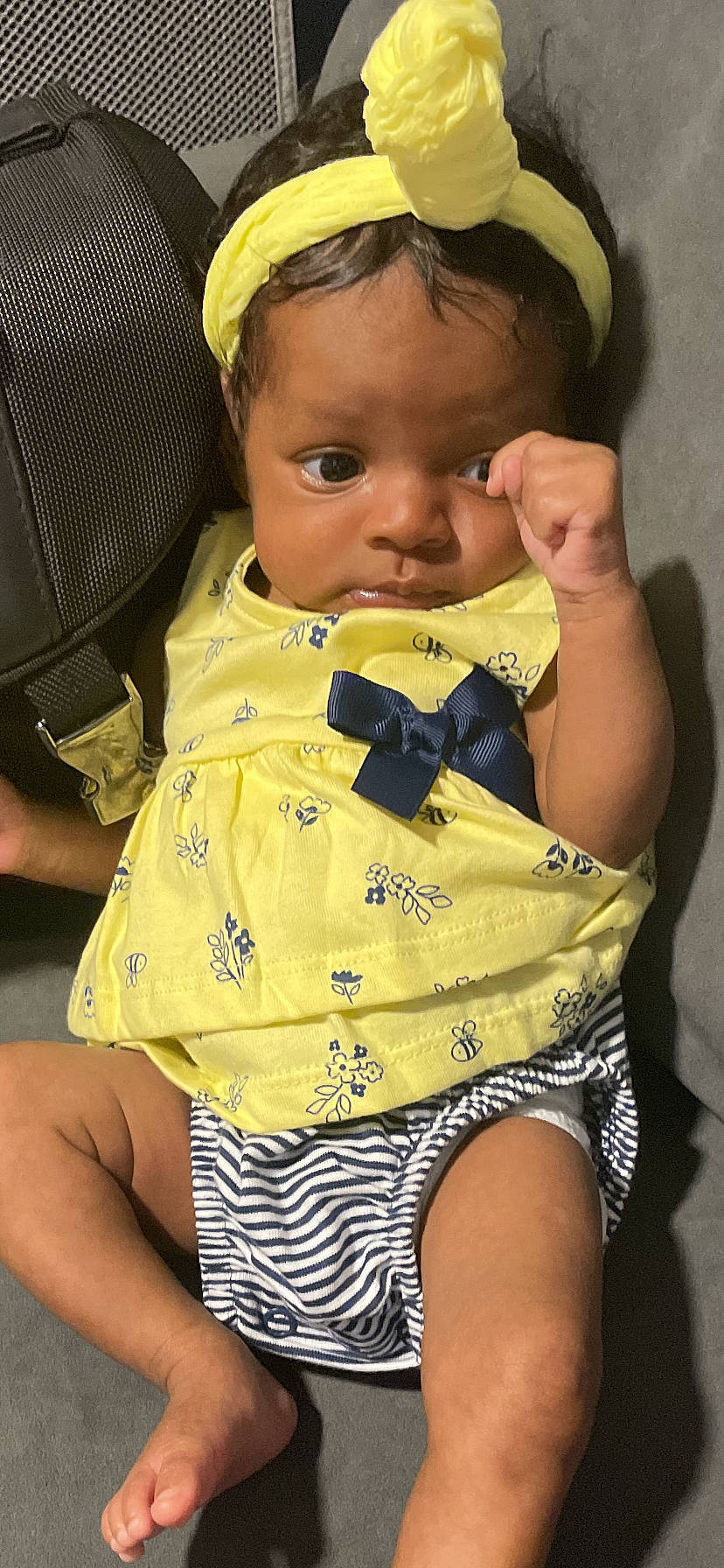 Nayve is registered to the contest to win money with this photo: baby_toddler_clothing, black, cheek, eyebrow, eyelash, face, green, hair, hairstyle, head, joint, lip, nose, organ, person, photograph, skin, sleeve, standing, white