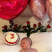Connor is registered to the contest to win money with this photo: baby, infant, sleeping, balloons, red_balloons, pink_balloons, cake, roses, red_roses, diaper, milestone_sign, three_months, pillow, bed, celebration, party, cream_cake, flowers, cute, portrait