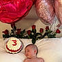 baby, infant, sleeping, balloons, red_balloons, pink_balloons, cake, roses, red_roses, diaper, milestone_sign, three_months, pillow, bed, celebration, party, cream_cake, flowers, cute, portrait