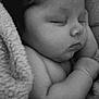 Esaya a rejoint le concours — aidez-le/la à gagner de superbes lots ! baby, sleeping, blanket, closeup, black_and_white, infant, soft_texture, peaceful, child, face, arm, portrait, tender, cuddly, newborn, cute, resting, cozy, skin, quiet