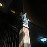 Wechawa joined the competition — help win amazing prizes! cat, tabby, wood, banister, stairs, indoor, shadow, light, perched, feline, animal, pet, quiet, contemplative, dark, wood_paneling, railing, home, mood, contrast