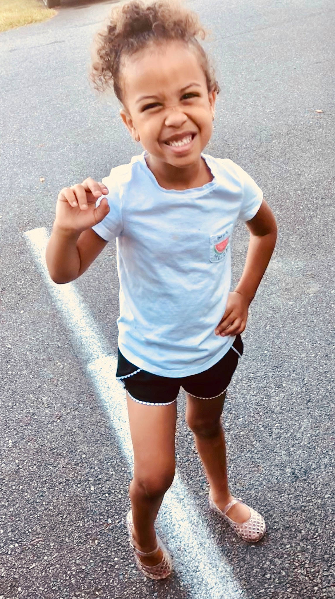 Essence is registered to the contest to win money with this photo: child, facial_expression, fun, happy, joy, person, play, recreation, running, shorts, skin, sleeve, smile, standing, summer, t_shirt, toddler, vacation, walking