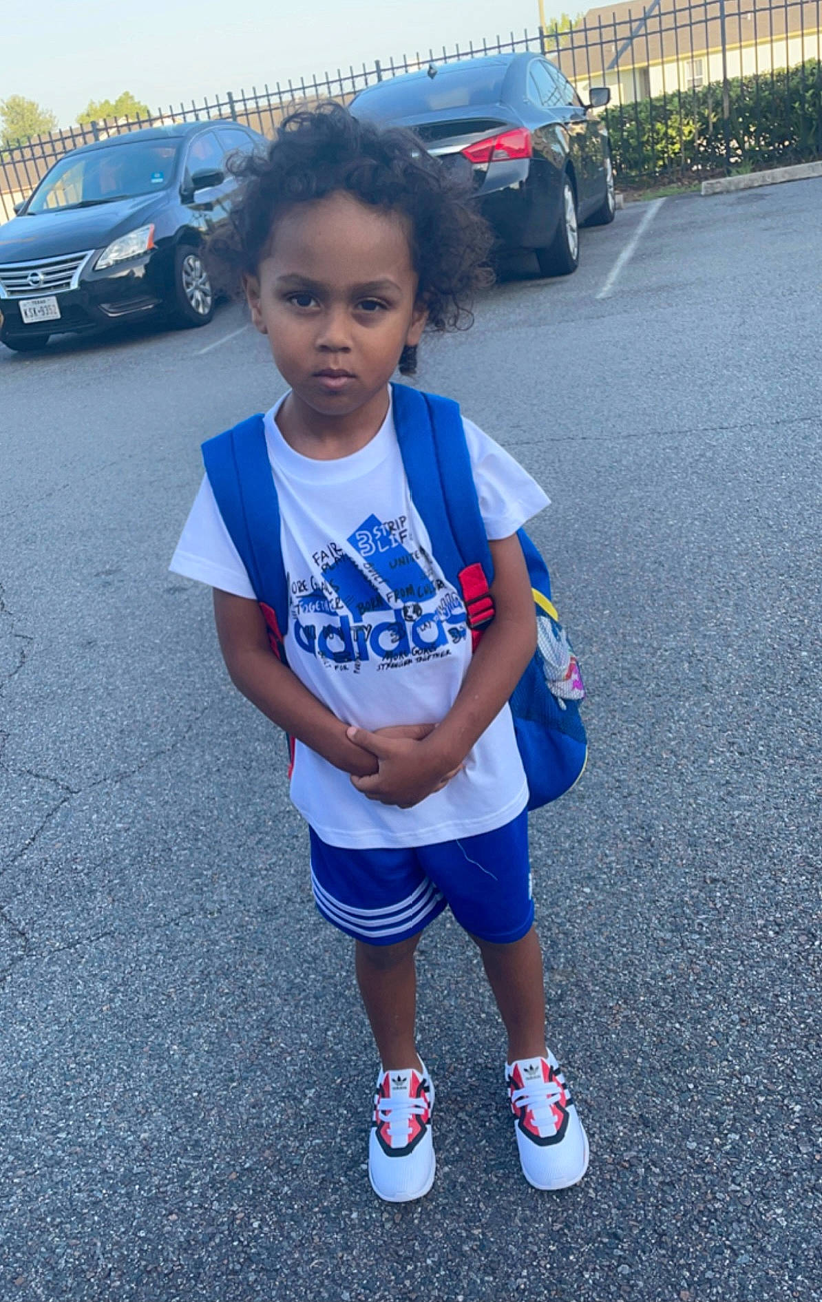 Malcolm joined the competition — help win amazing prizes! asphalt, automotive_lighting, automotive_tire, bumper, car, cool, knee, land_vehicle, motor_vehicle, person, shoe, shorts, sleeve, sneakers, t_shirt, thigh, tire, vehicle, vehicle_door, wheel