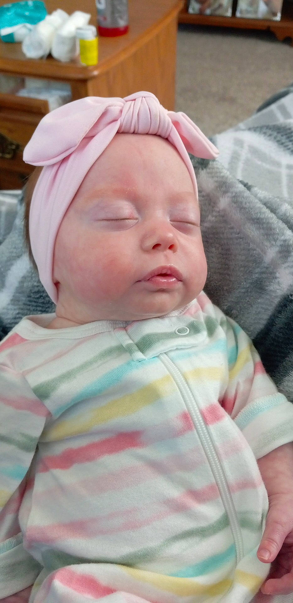 Ensley is registered to the contest to win money with this photo: baby, baby_sleeping, baby_toddler_clothing, bedtime, cap, cheek, child, comfort, eye, eyebrow, eyelash, hat, headwear, linens, lip, mouth, nose, person, pink, skin