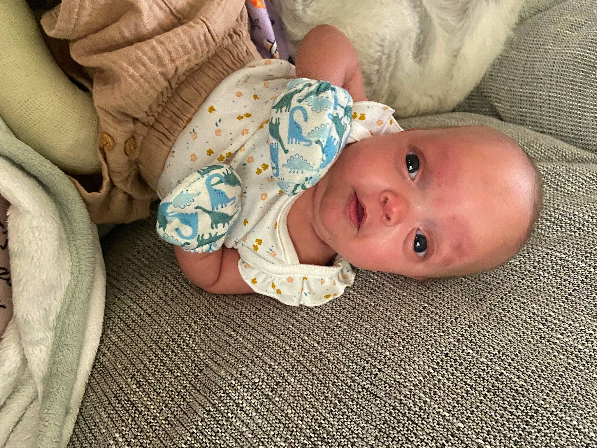 Calypso joined the competition — help win amazing prizes! baby, baby_products, baby_safety, baby_sleeping, baby_toddler_clothing, cheek, child, comfort, flooring, headgear, human_body, linens, pattern, person, room, sitting, skin, sleeve, smile, toddler