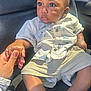 Kaji joined the competition — help win amazing prizes! baby, child, infant, car_seat, hand, holding_hand, shirt, fish_pattern, shorts, footwear, sunlight, seat, interior, person, skin, face, eyes, expression, clothing, casual