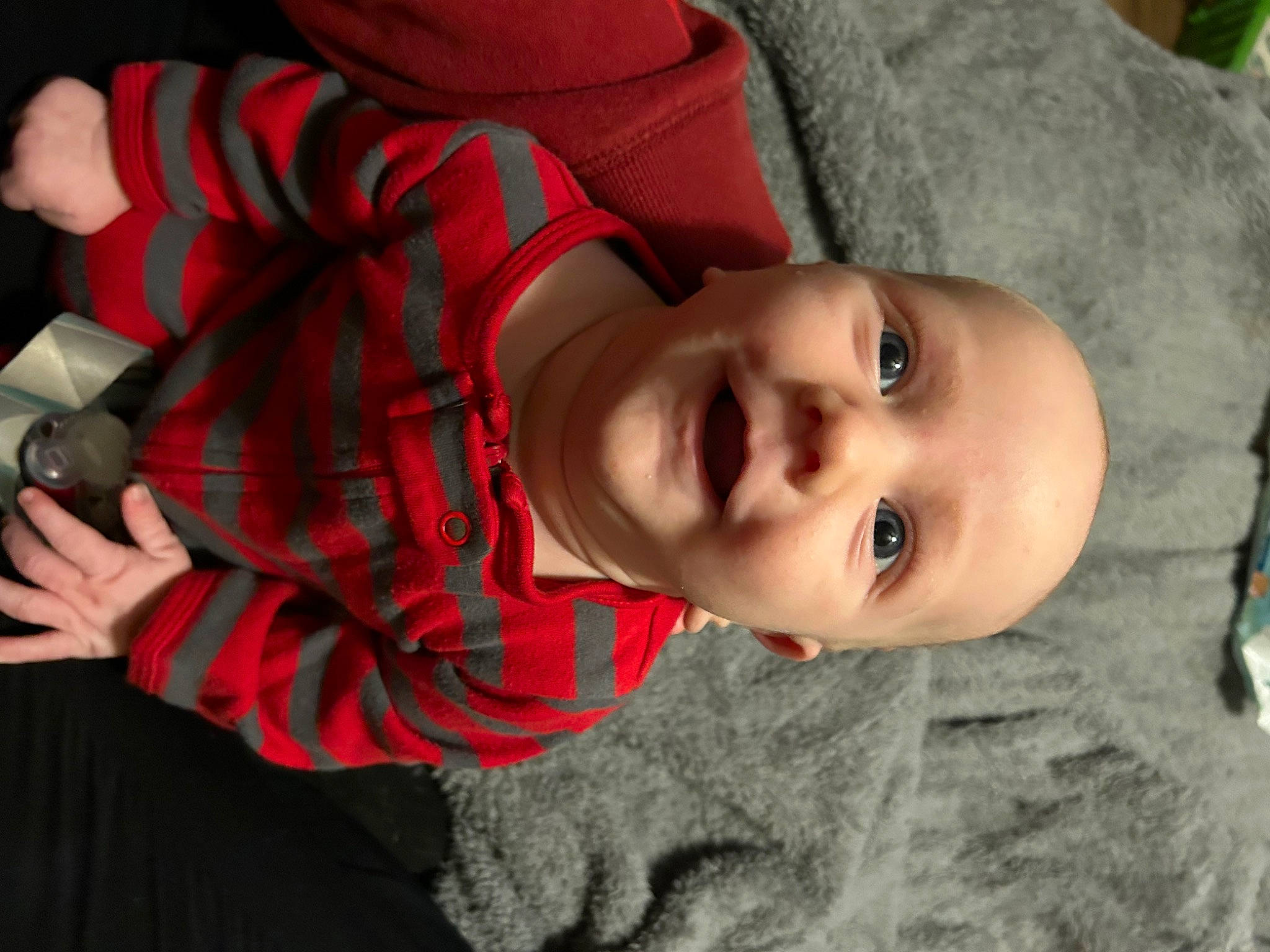 Beckett is registered to the contest to win money with this photo: baby, child, cool, facial_expression, fun, happy, hat, headgear, human_body, joy, lip, mouth, nose, person, plaid, plant, skin, smile, tartan, toddler