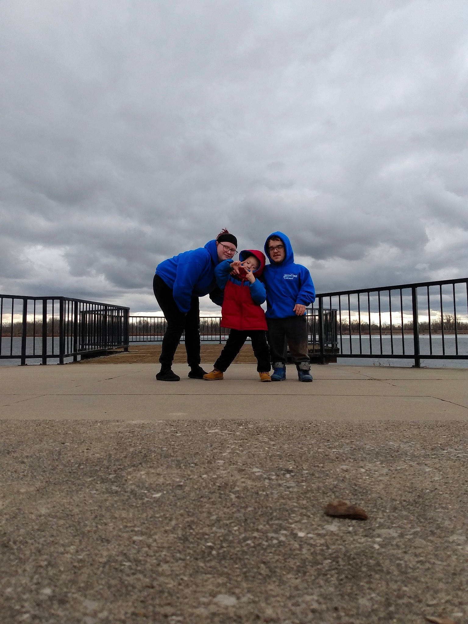 Cameron joined the competition — help win amazing prizes! asphalt, body_of_water, city, cloud, electric_blue, fence, gesture, headwear, horizon, human_leg, jeans, landscape, leisure, luggage_and_bags, ocean, pedestrian, person, recreation, road, sitting