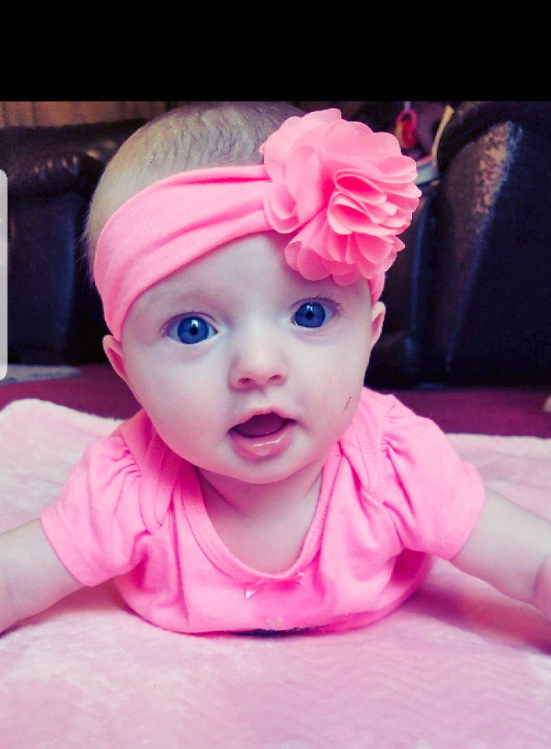 Gemma is registered to the contest to win money with this photo: baby, beauty, cheek, child, ear, eye, face, fashion_accessory, flower, forehead, hair_accessory, head, headband, headgear, headpiece, headwear, lip, person, pink, plant
