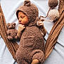 newborn, baby, sleeping, costume, bear, plush, soft, blanket, pom_poms, cute, infant, cozy, resting, hands, feet, toy, warm, child, portrait, adorable
