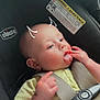 Malachi joined the competition — help win amazing prizes! baby, infant, car_seat, chicco, child, tongue_out, fingers, yellow_shirt, seatbelt, cute, playful, doodle, digital_art, straps, sitting, close_up, car_interior, warning_label, head, skin