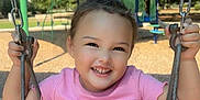 Elli'Ana is registered to the contest to win money with this photo: child, toddler, swing, playground, smiling, happy, outdoor, park, play, summer, clothing, person, fun, daylight, seat, metal, greenery, trees, woodchips, casual
