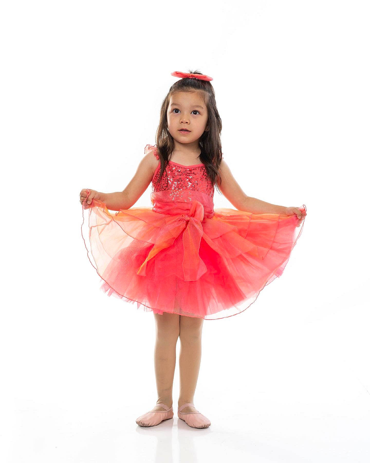 Brighton is registered to the contest to win money with this photo: art, dance, day_dress, dress, entertainment, event, fashion_design, flash_photography, footwear, happy, headpiece, human_body, human_leg, long_hair, magenta, one_piece_garment, performing_arts, person, thigh, toddler